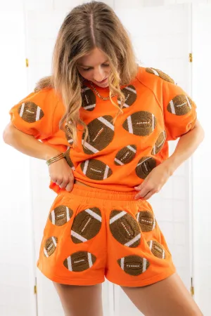 Queen of Sparkles Orange Fuzzy Football Shorts